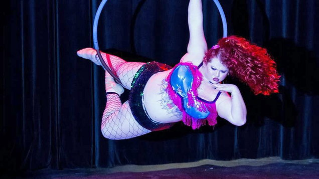 Burlesque performer nipple slip stage